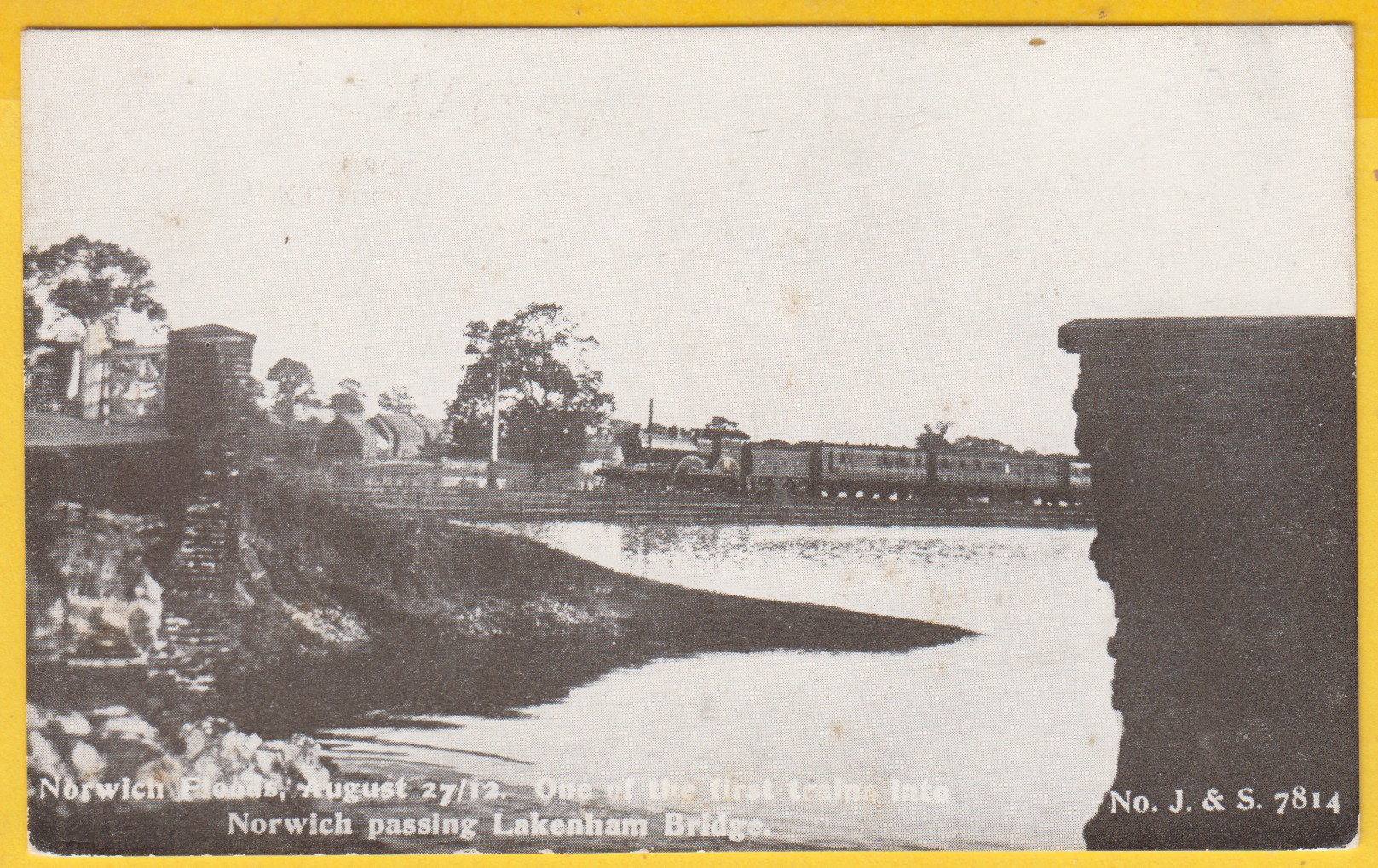 postcard-norfolk-floods-august-2712-one-of-the-first-trains-into-norwich-passing-lakenkam-bridge