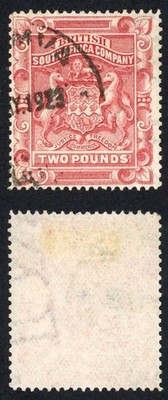 rhodesia-sg66-1-2d-grey-black-and-purple-scrolls-between-legs-used-cat-10-pounds