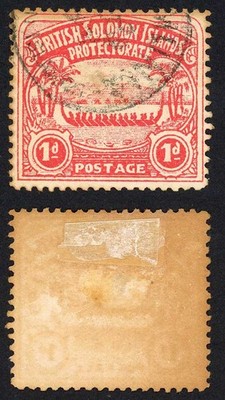 solomon-is-1d-large-canoe-forgery-wrong-perf-type-paddle-touching-shore