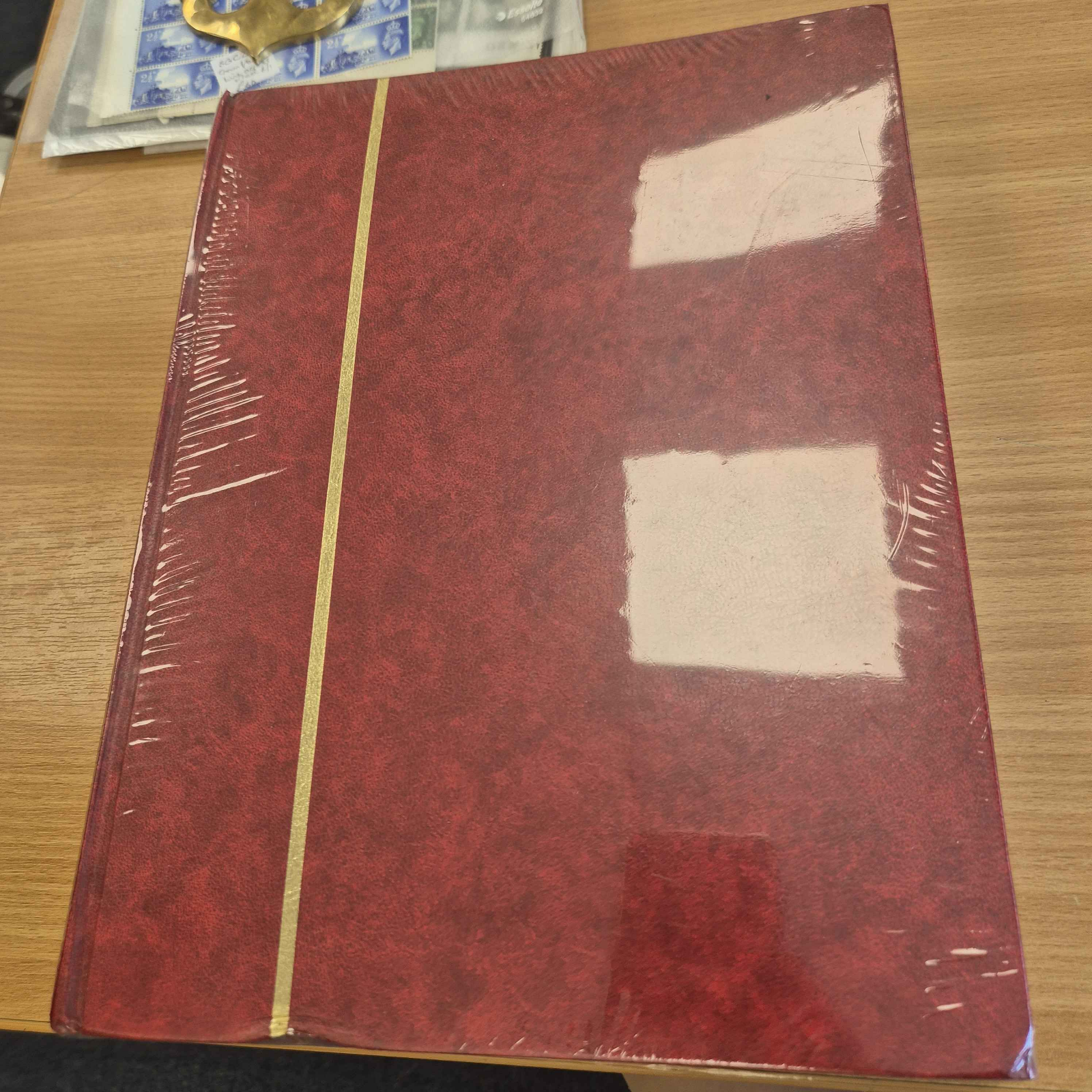 red-stamp-stock-album-sealed-in-packaging-includes-pages-unbranded