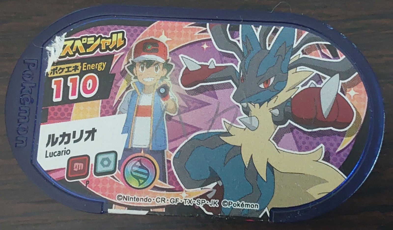 pokemon-mezastar-disk-lucario-purple-tag-p-energy-110-used